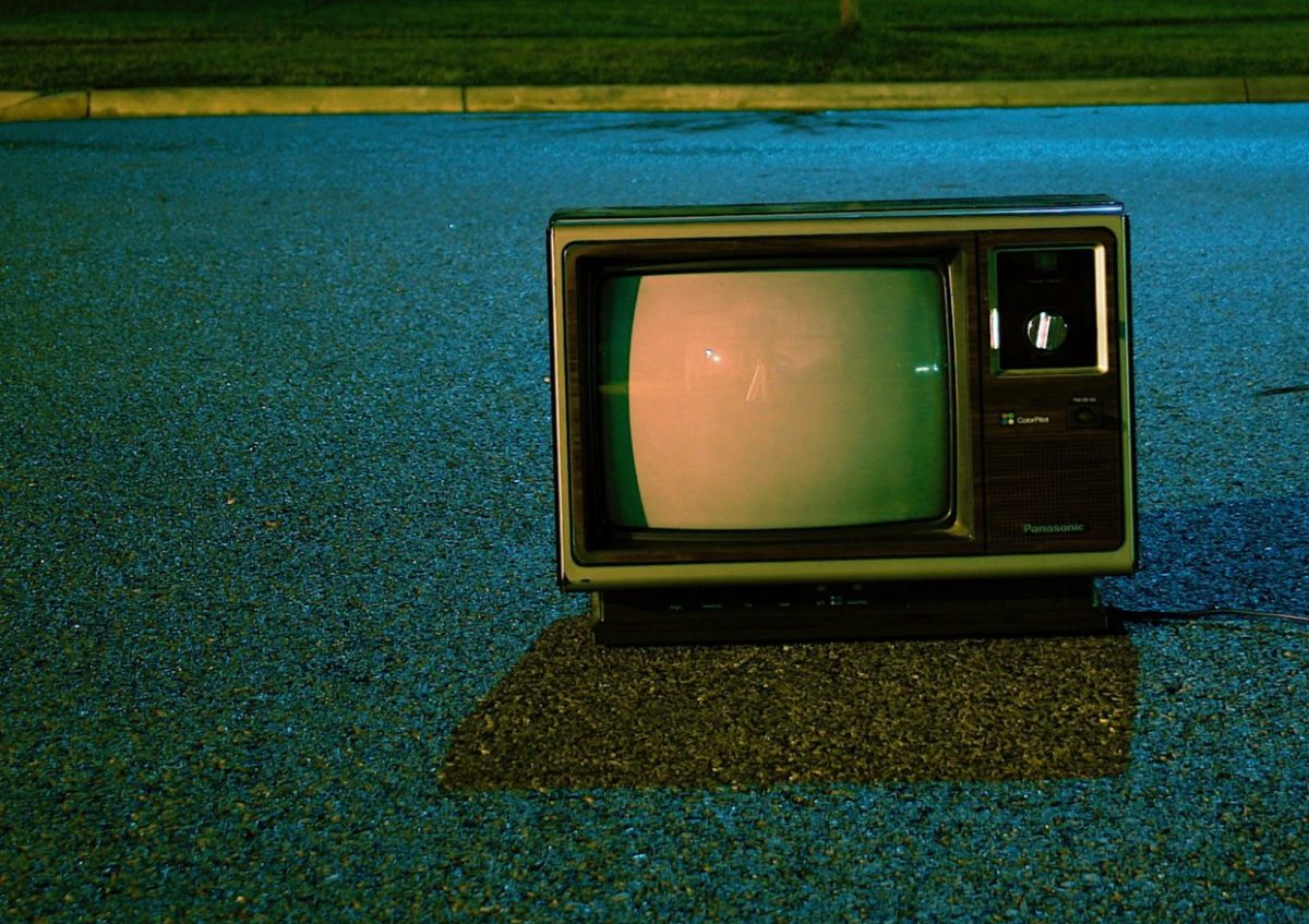 turned off vintage CRT television on road